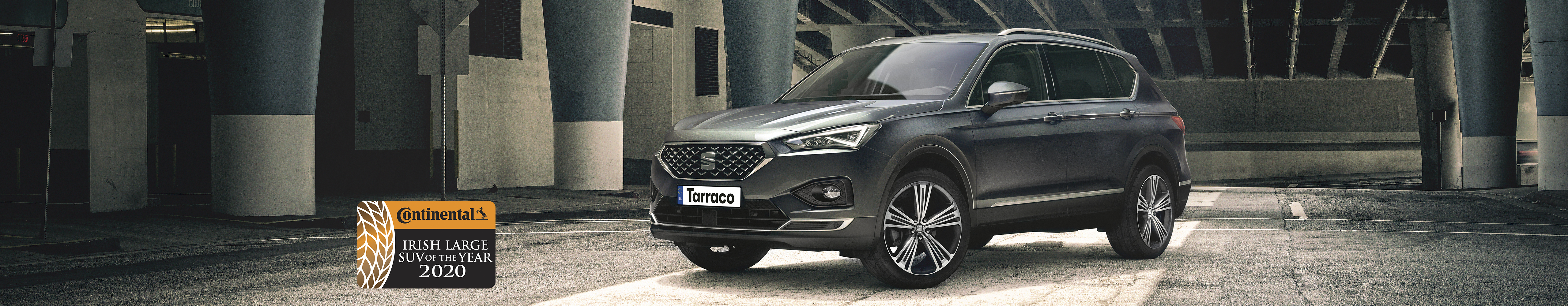 SEAT Tarraco SUV 7 seater parked outside building beauty shot