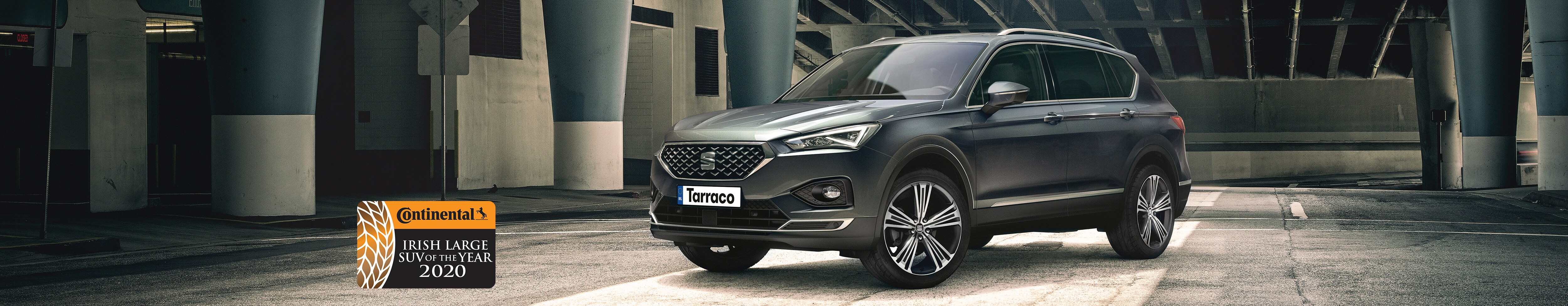 SEAT Tarraco SUV 7 seater parked outside building beauty shot