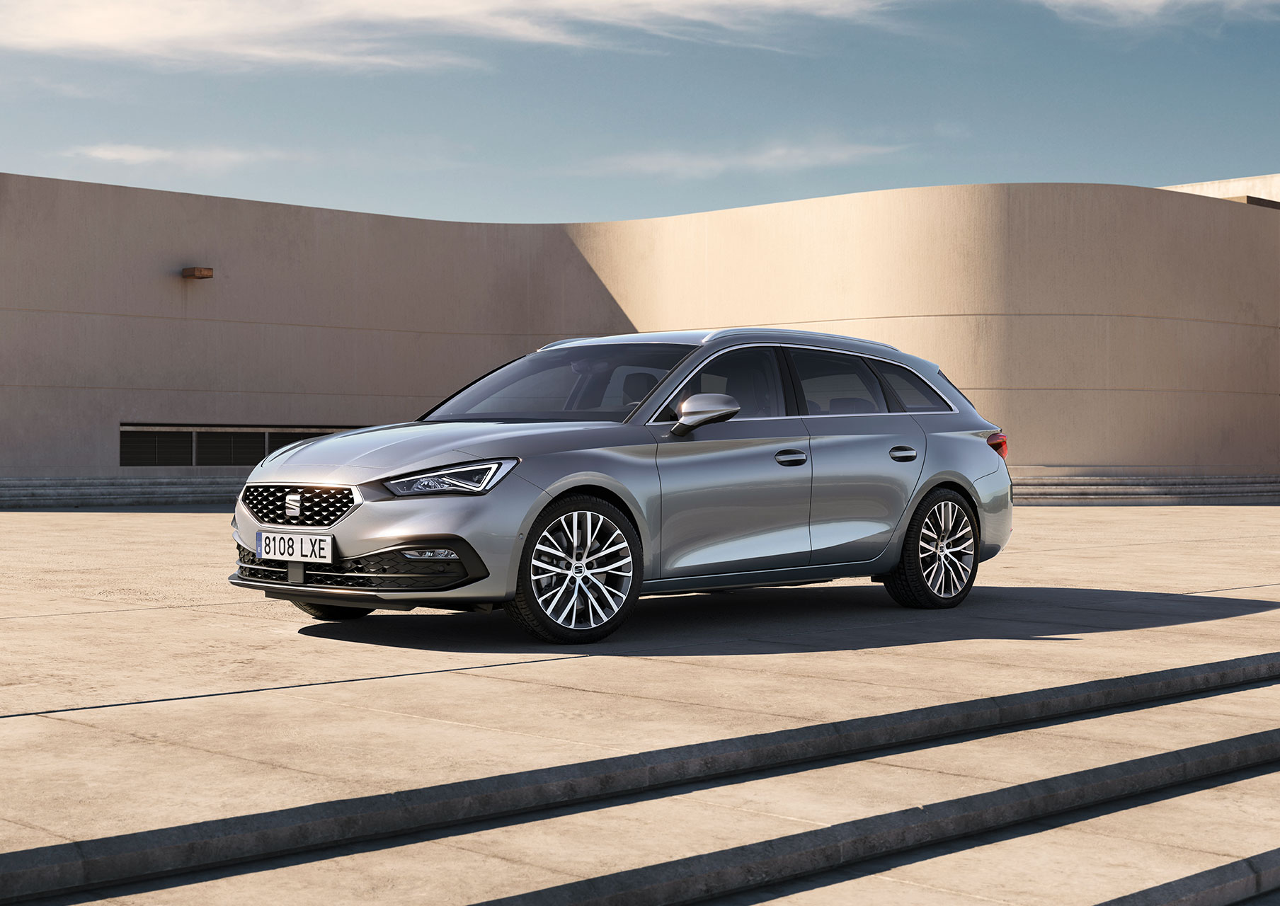 seat leon sportstourer xcellence trim urban silver colour with machined alloy  wheels parked