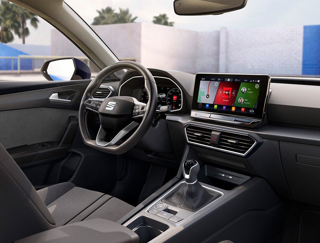 sseat leon interior view of the steering wheel and infotainment screen